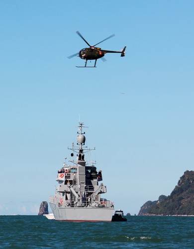 Hughes 500 attacking NZ warship - Whitianga Festival of Speed © SW